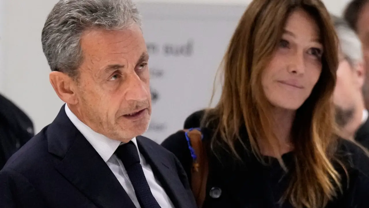 Nikola Sarkozi sa suprugom