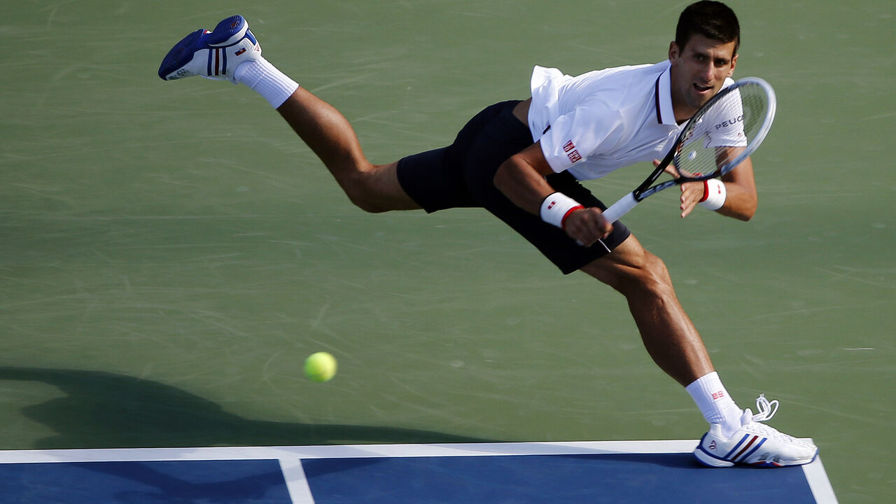 Novak Đoković u meču drugog kola US Opena protiv Filip-Anri Matjea