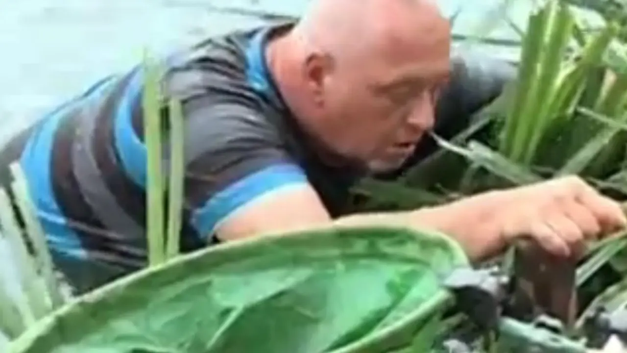 Pijani pecaroš izlazi iz reke