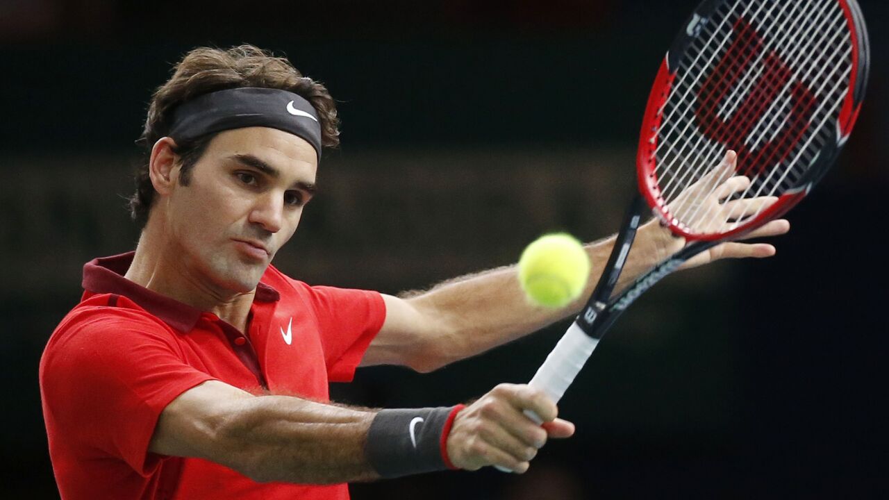 Rodžer Federer u meču protiv Miloša Raonića u prvom kolu Masters finalnog turnira u Londonu