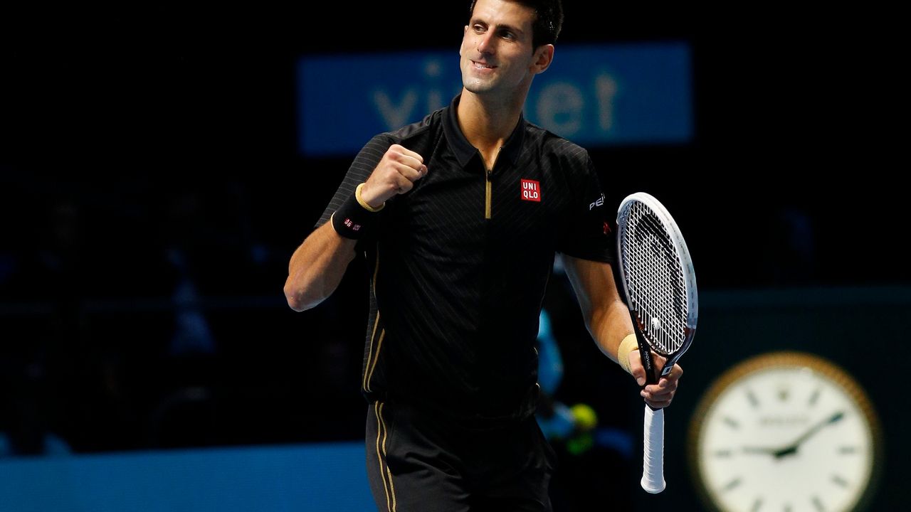 Novak Đoković slavi pobedu protiv Marina Čilića na finalnom turniru sezone u Londonu
