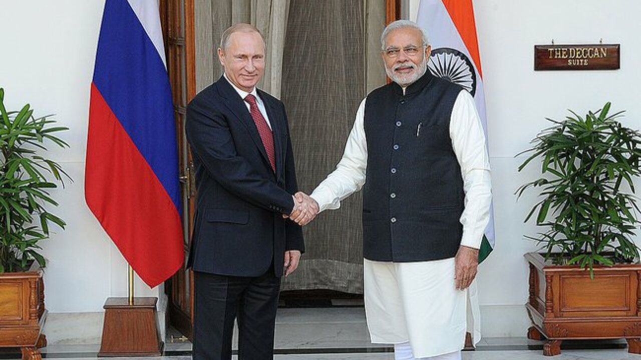 Susret Putina i Modia