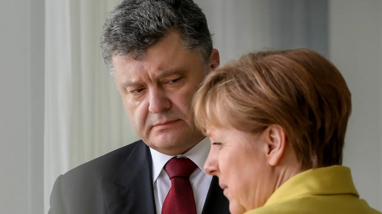 Petro Porošenko i Angela Merkel na sastanku u Nemačkoj