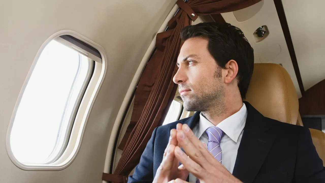 Biznismen u avionu