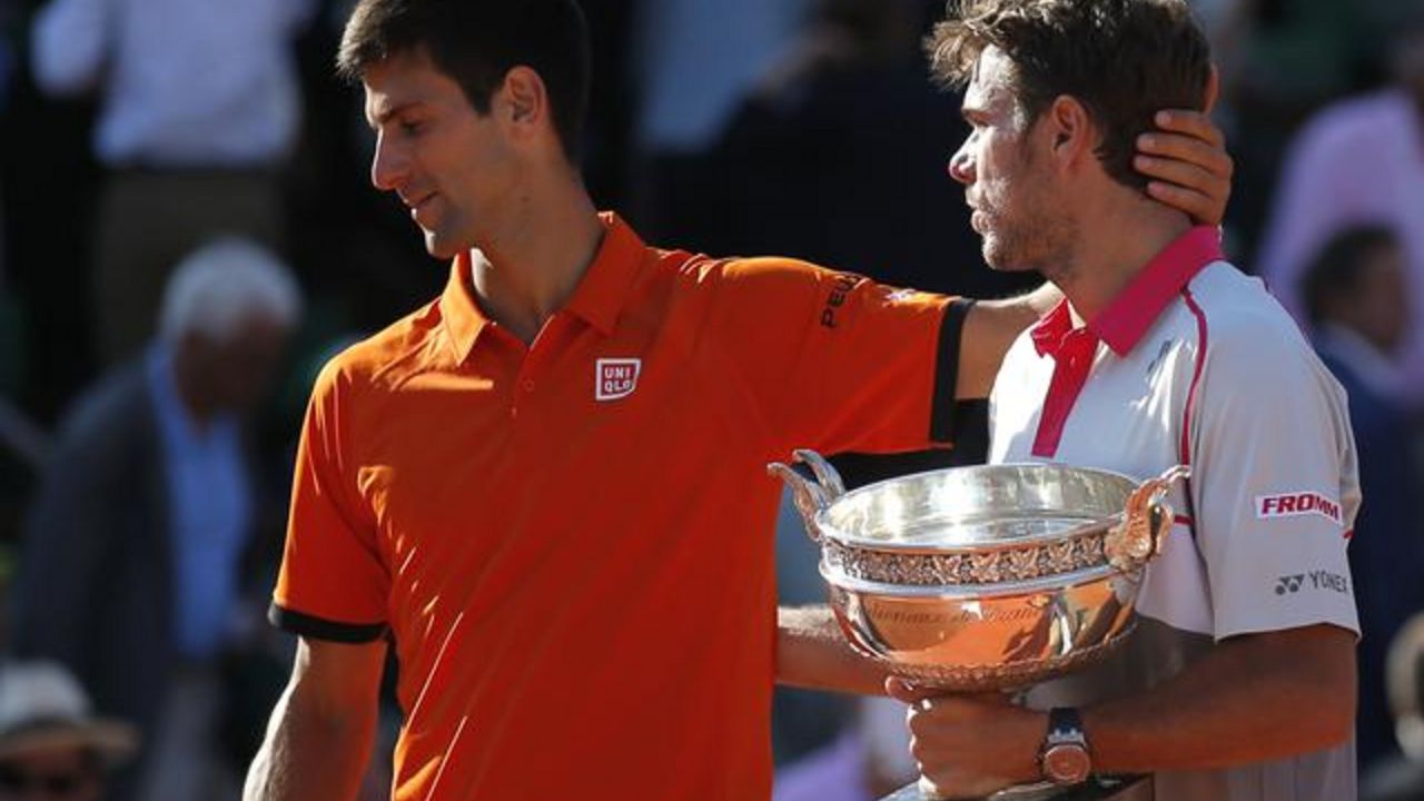 Novak Đoković sa Vavrinkom posle finala Rolan Garosa