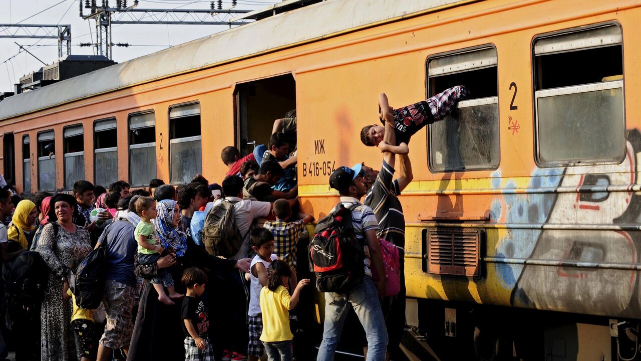 migranti u vozu