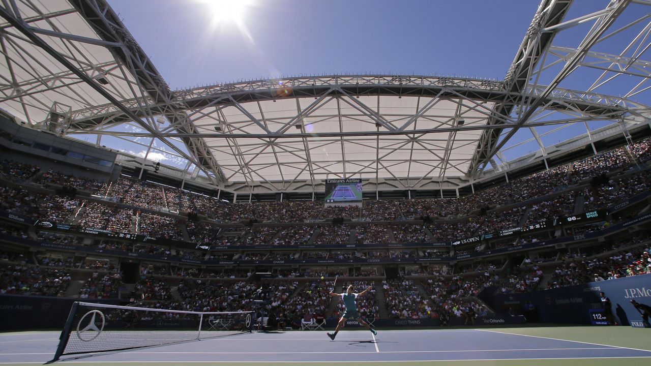 Rodžer Federer u meču protiv Filipa Kolšrajbera na US Openu