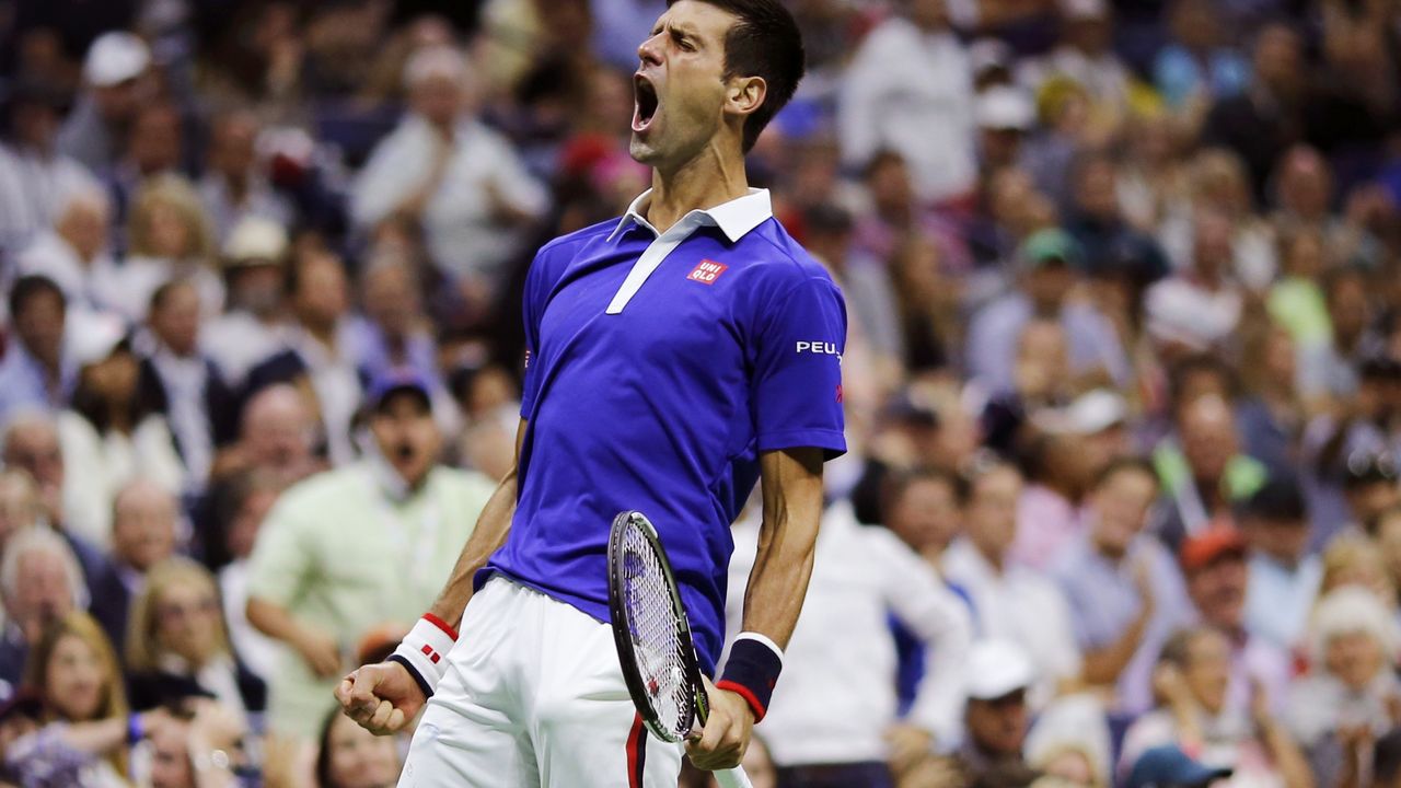 Novak Đoković proslavlja poen u finalu US opena protiv Rodžera Federera
