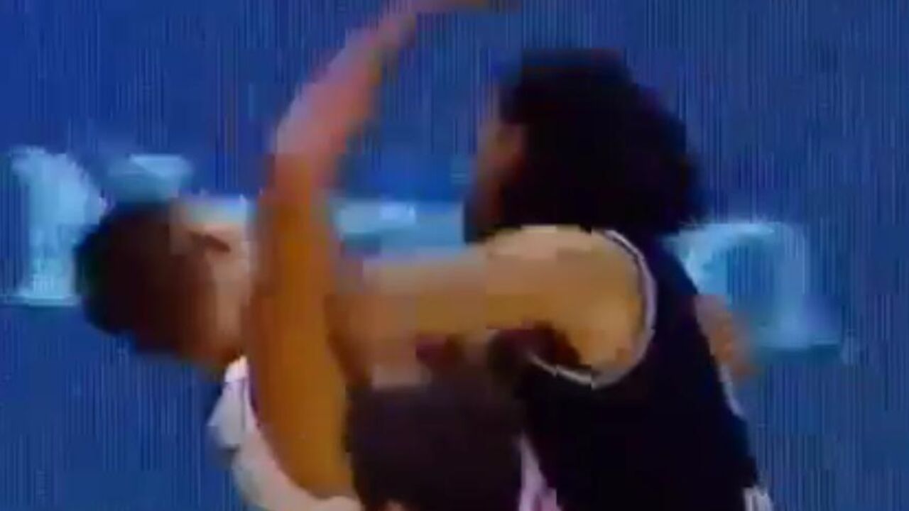 Nikola Jokić i Luis Skola