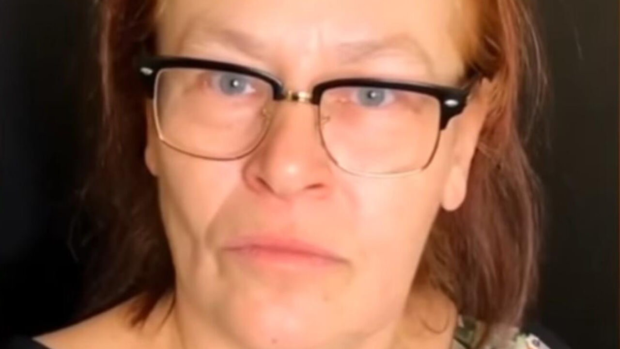 žena