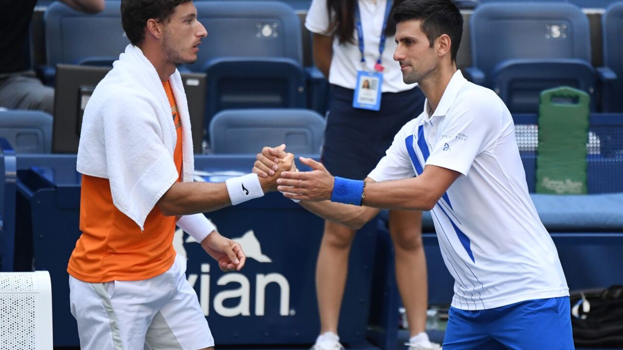 Roberto Karenjo-Busta i Novak Đoković