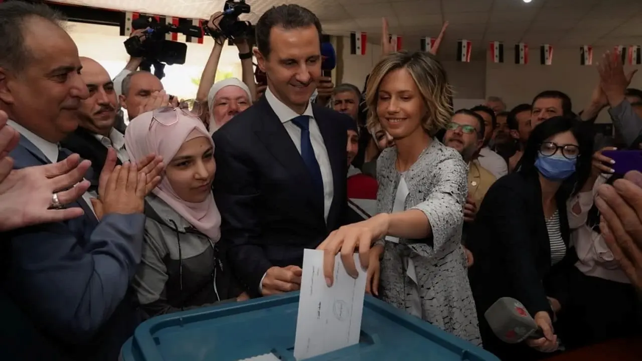 Bašar al Asad sa suprugom Asmom na glasanju
